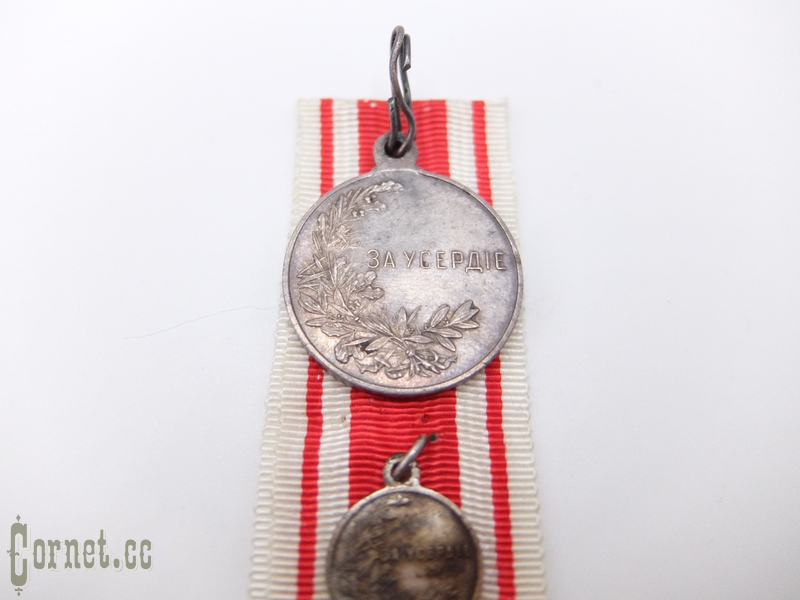 Medal and miniature "For Zeal"