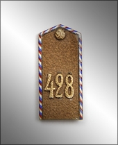 Jetton in the form of a shoulder strap of 428 regiment