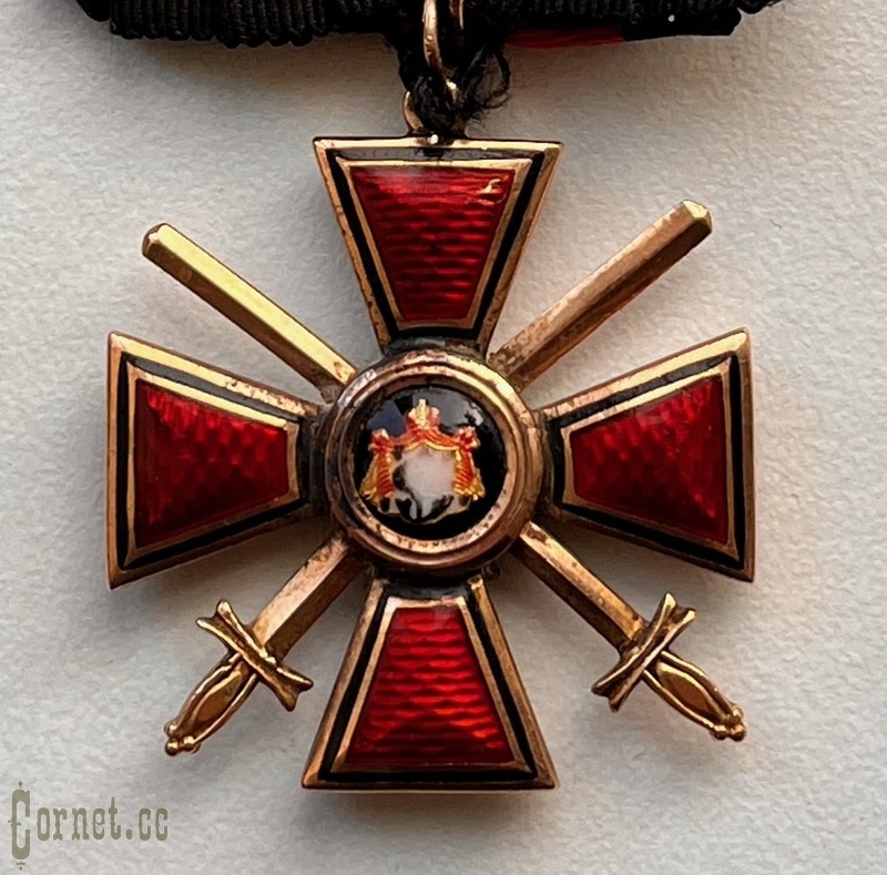 Орден Св. Владимира 4-й степени с мечами и бантом.